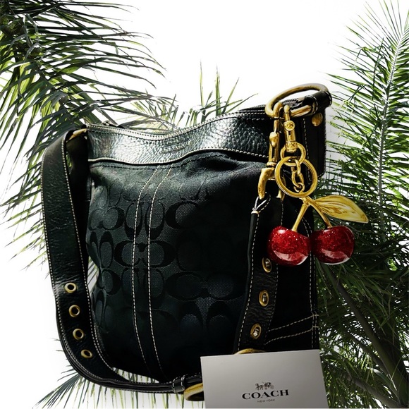Coach Handbags - Vintage Coach soho Black Shoulder Bag with Cherry Charm 2006